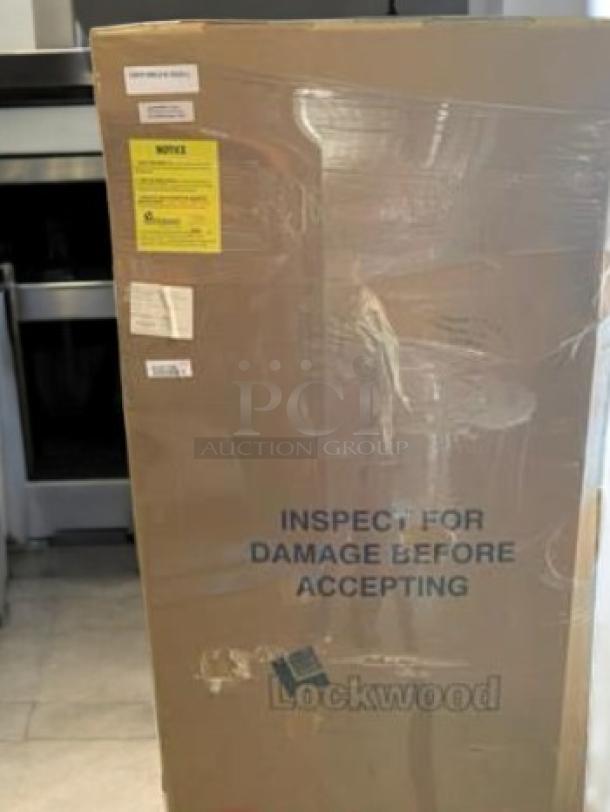 Lockwood enclosed sheet pan rack, excellent condition, 20 pan capacity, fully tested, includes caution labels, securely wrapped.
