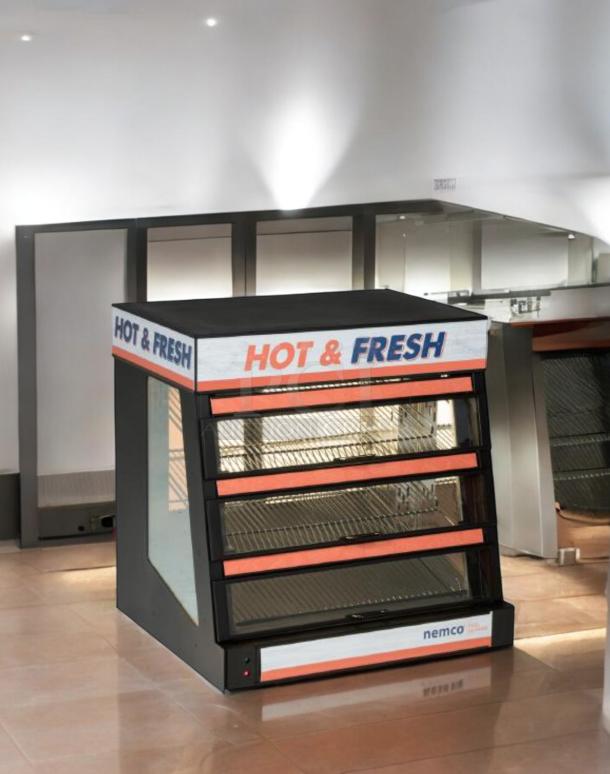 Nemco 6480 Hot Food Display Merchandiser, excellent condition, tested, "Hot & Fresh" signage, black with orange accents.