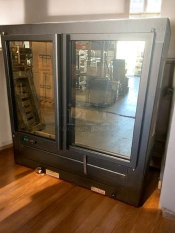 Nemco Model 6480 Hot Food Display Merchandiser in excellent condition. Features dual glass doors, tested and fully operational.