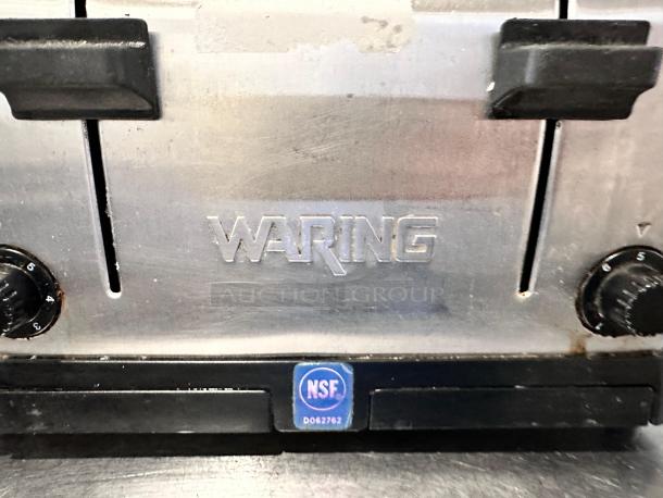 Waring Commercial WCT708 four-slice toaster in excellent condition, 1800W, with visible controls and NSF certification label.