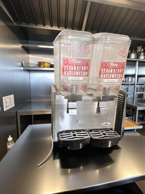 Crathco D25-3 beverage dispenser, excellent condition, dual 5-gallon bowls, fully tested, stainless steel, Pure Strawberry Watermelon labels.