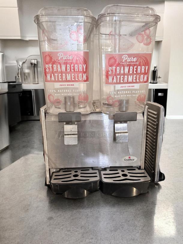 Crathco D25-3 beverage dispenser with dual 5-gallon bowls. Excellent condition, fully tested, stainless steel base.