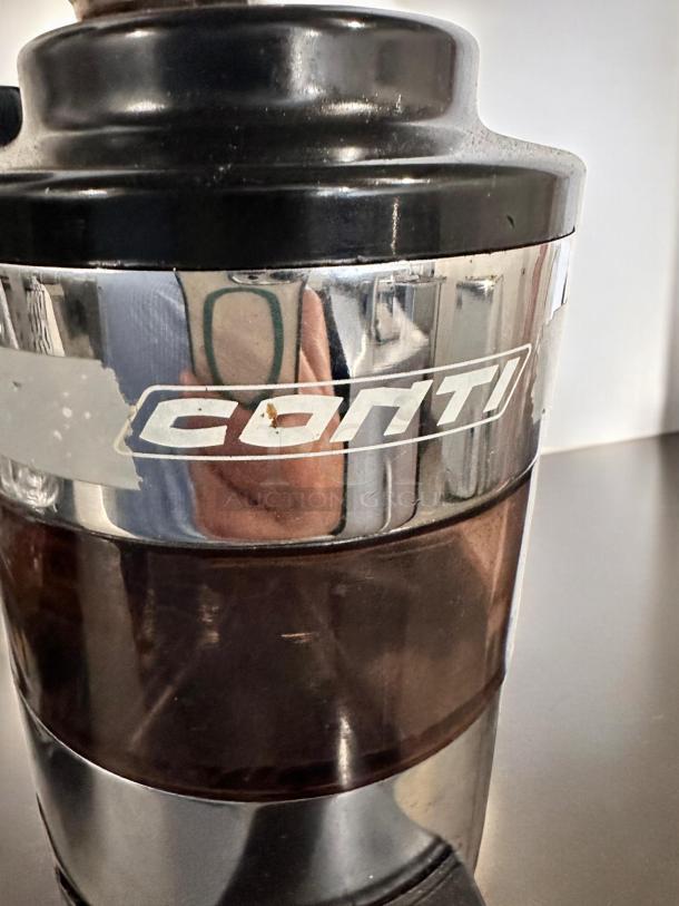 Conti RR45 Espresso Coffee Grinder, excellent condition, glossy black finish, Conti logo visible. Made in Italy.