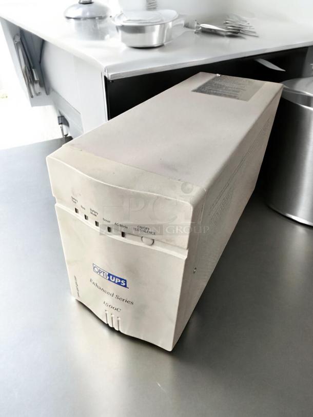 OPTI UPS Enhanced Series 1500C, 980W, excellent condition, fully tested, working, model ES1500C, front panel view.