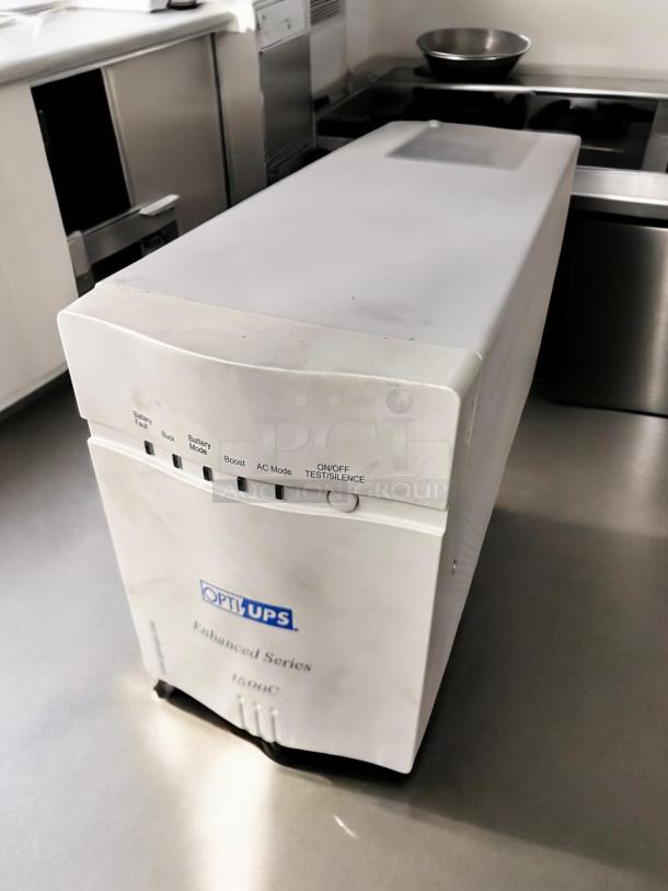 OPTI UPS Enhanced Series 1500C in excellent condition, 980W, fully tested and working, model ES1500C, white casing.