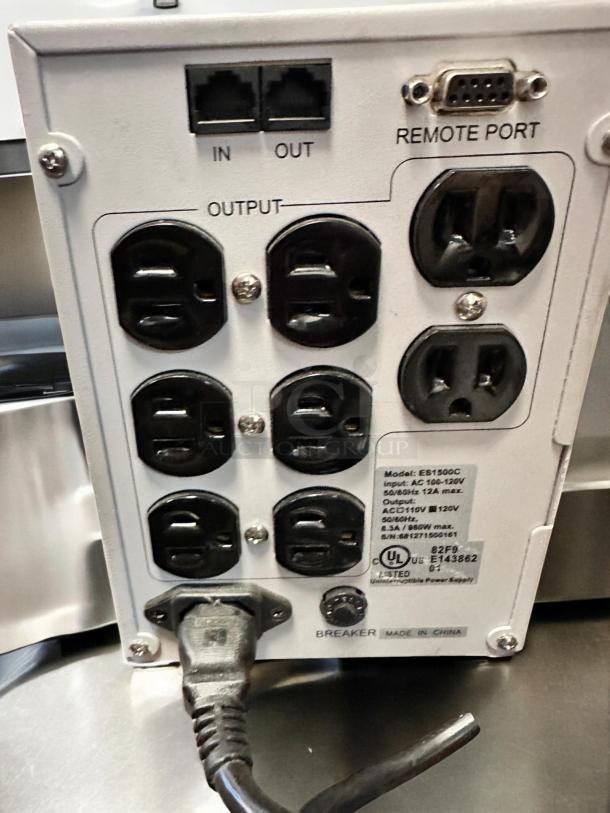 OPTI UPS Enhanced Series 1500C in excellent condition, 980W, fully tested. Features multiple output ports, remote port, model ES1500C.