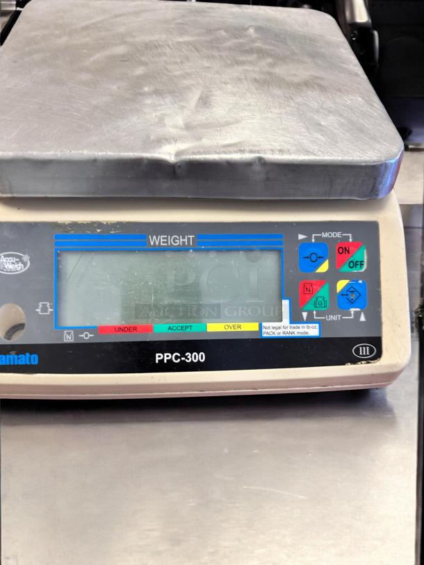 Yamato PPC-300 digital scale in excellent condition, featuring a large weighing platform and clear display, fully tested and working.