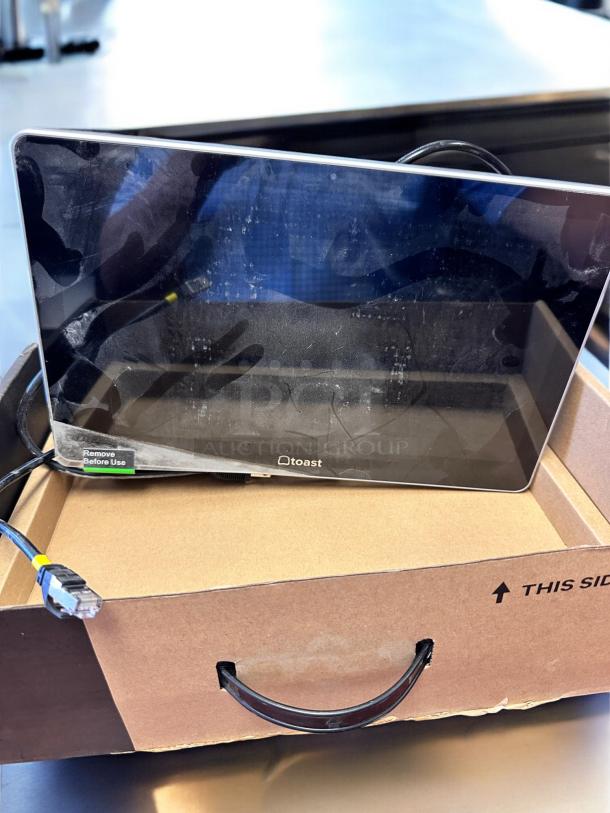 Toast POS Touchscreen System in excellent condition, fully tested. Comes in original packaging, includes necessary cables.