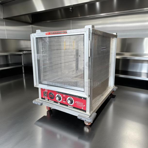 Win-Holt NHPL-1810/HN-CA/LC heater/proofer cabinet in perfect condition, visible controls, on casters.