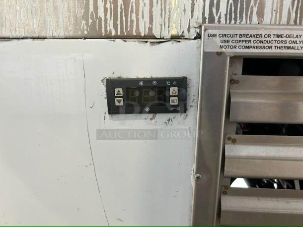Cool Tech refrigerated display case, straight glass design, visible temperature control panel, tested and working condition.
