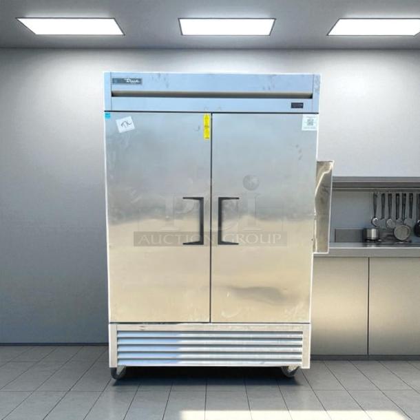 True T-49F-HC 2-Door Reach-In Freezer, stainless steel, excellent condition, 115V, fully tested, visible labels.