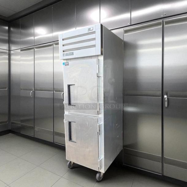 True STA1R-2HS reach-in refrigerator, 1 section, solid half doors, stainless steel, on casters, tested and working.