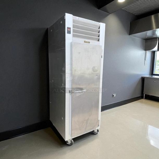 Traulsen G10010 commercial refrigerator in excellent condition, 115V, fully tested, on wheels.