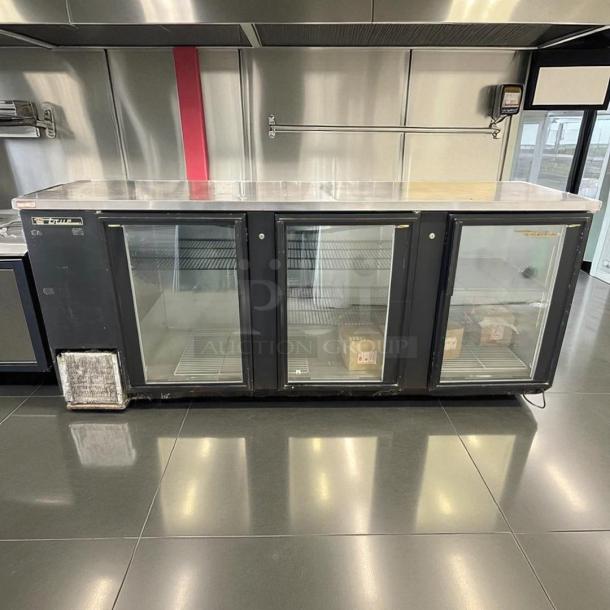 True TBB-4G-HC-LD 90 3/8" back bar refrigerator with glass doors, black finish, LED lighting, fully tested, excellent condition.
