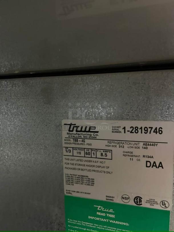 True TBB-4G back bar refrigerator label, showing model, serial number, voltage, and refrigerant details.