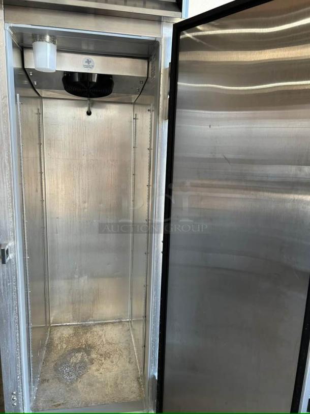 Continental 1FN 26" reach-in freezer, great condition, right-hinged solid door, interior view, 115V, tested and working.