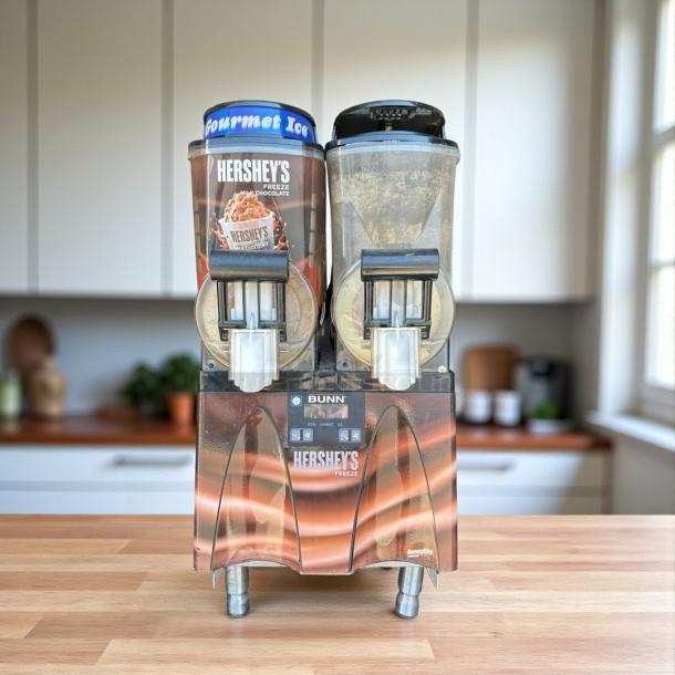 Bunn Ultra-2 frozen drink machine in excellent condition with Hershey's branding, two transparent dispensers, and control panel.