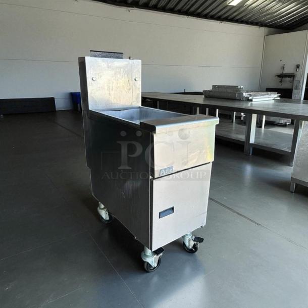 Pitco VF35 35 lb natural gas fryer, excellent condition, fully tested. Stainless steel, on casters, model label visible.