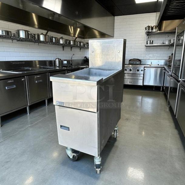 Pitco VF35 35 lb natural gas fryer in excellent condition. Fully tested and working, stainless steel exterior, mobile on wheels.