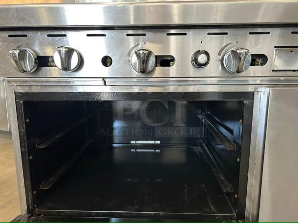 Atosa AGR-2B24GR 36" gas range with open burners and griddle, stainless steel, fully tested, excellent condition.