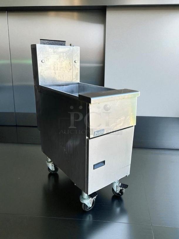 Pitco VF-35S gas fryer, 35 lb vat, natural gas, floor model, great condition, fully tested, on wheels, silver finish.