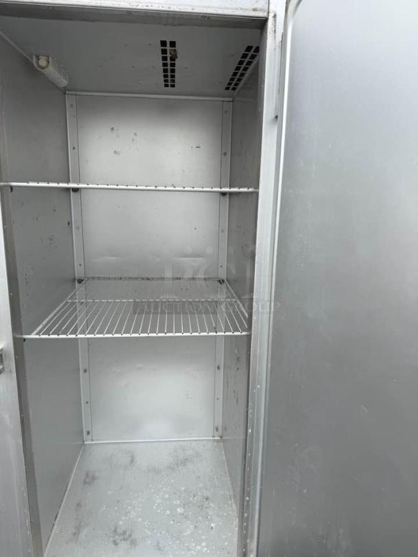 Traulsen G10010 commercial refrigerator, excellent condition, 115V, fully tested, interior view with shelving.