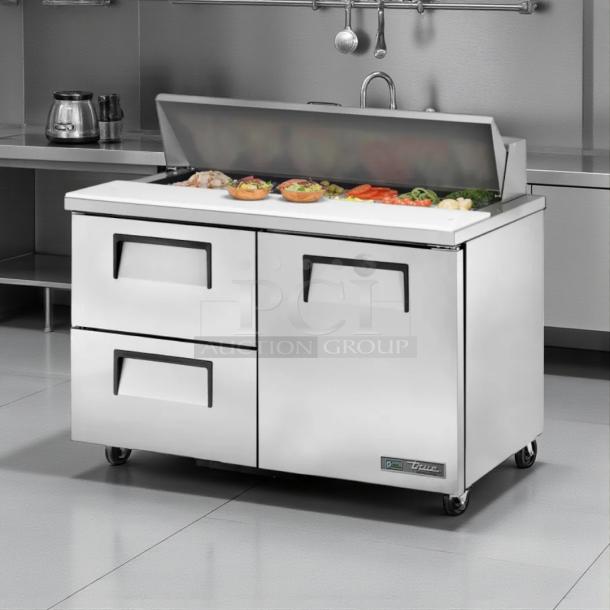 True TSSU-48-12D-2 sandwich prep table, 48", excellent condition, 115V, stainless steel, with storage drawers, tested and working.