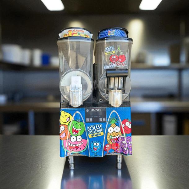 Bunn Ultra-2 frozen drink machine in excellent condition, featuring dual tanks, Jolly Rancher branding, and 120V power.