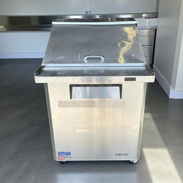 Turbo Air MST-28-12-N sandwich prep table in excellent condition. Stainless steel, labeled, fully tested, 115V.