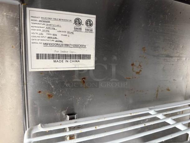Label on Atosa MSF8302 salad prep table refrigerator; shows model, temperature range, serial info, and "Made in China."