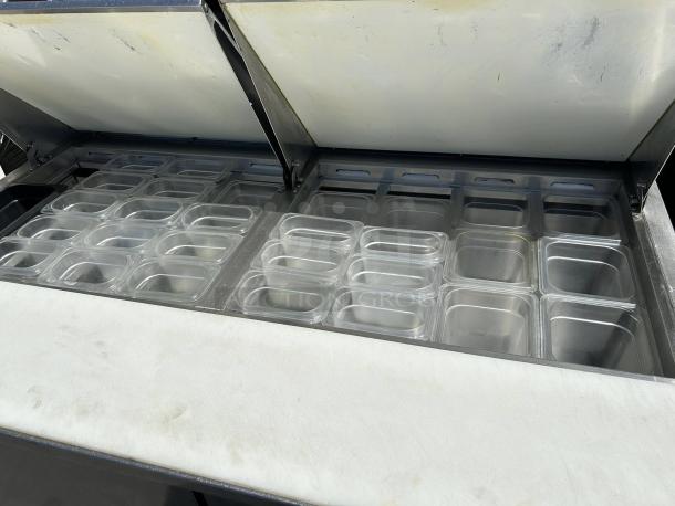 Everest EPBWR2 swing top prep table with 24 pans, 16 cu. ft., NSF certified, in excellent condition, 115v.