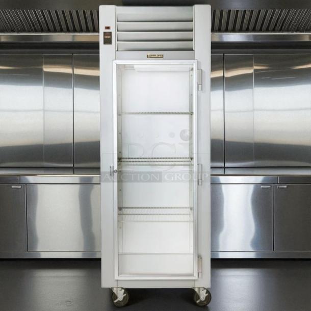 Traulsen G11010 reach-in refrigerator, excellent condition, right-hinged glass door, 29 7/8", 115v, tested and working.