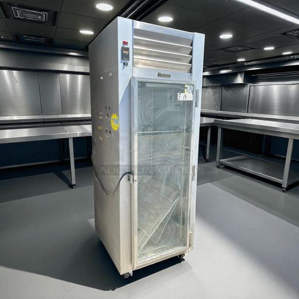 Traulsen G11010 reach-in refrigerator, excellent condition, 29 7/8", right hinge glass door, marked 115v, tested and working.