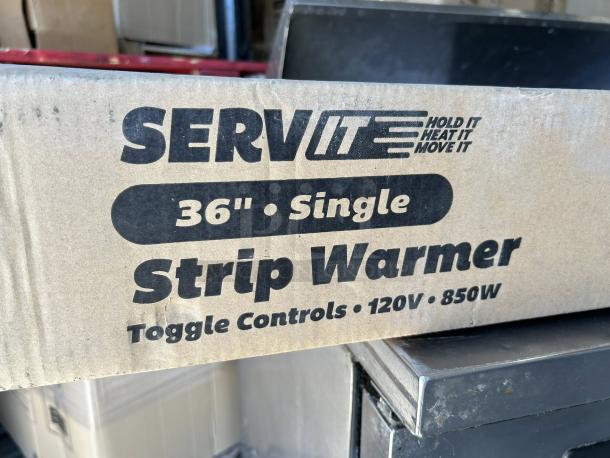 Brand new ServIt SWT-36CP 36" strip warmer, 850W, 120V, with toggle controls, in original packaging.