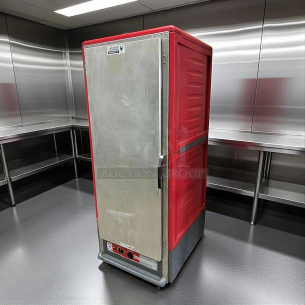 Metro C539-HFS-U heated holding cabinet in red, solid door, tested and working, stainless steel, used condition.