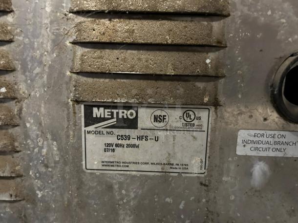Metro C539-HFS-U Heated Holding Cabinet label showing model, power specs, and NSF certification.