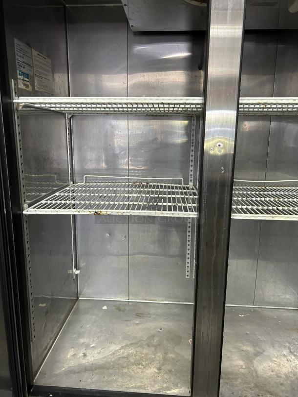 Turbo Air 2-Door Commercial Refrigerator, Model MSR-49NM, excellent condition. Interior shelves visible, fully tested and working.
