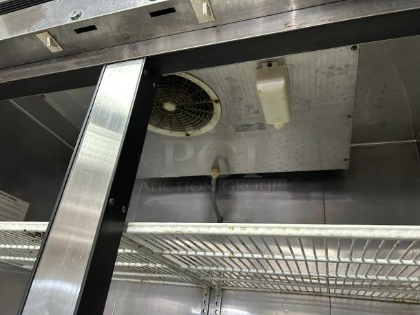 Turbo Air 2-Door Commercial Refrigerator, Model MSR-49NM, excellent condition, interior fan and shelving visible, fully tested.