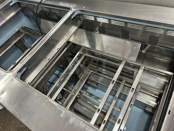 Delfield D4460NP-24M 60" refrigerated sandwich prep table, 4 drawers, stainless steel, excellent condition, tested and working.