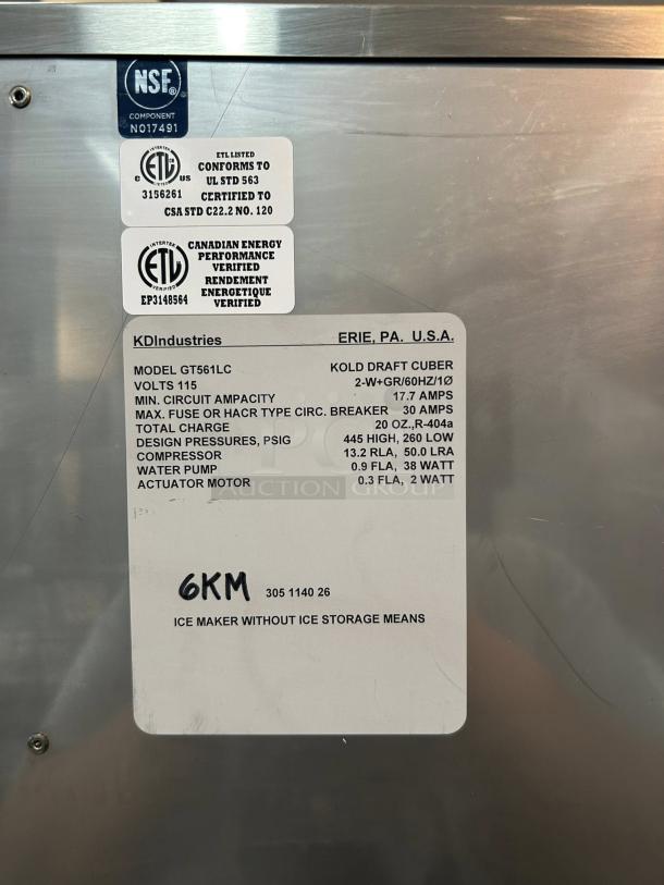 Kold-Draft GT561LC ice machine close-up, showing labels certifying ETL and NSF standards. Model details and specifications visible.