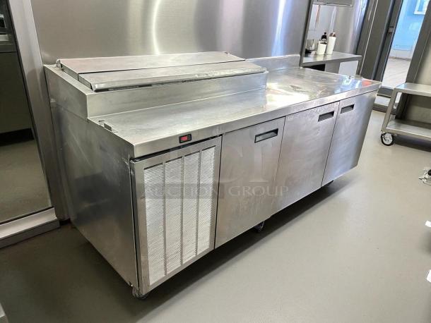 Delfield 3 Door Pizza Prep Table 115v, excellent condition, stainless steel, tested and working, with storage and prep space.