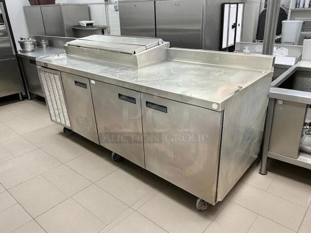 Delfield 3 Door Pizza Prep Table, excellent condition, stainless steel, tested, working, 115v, commercial kitchen use.