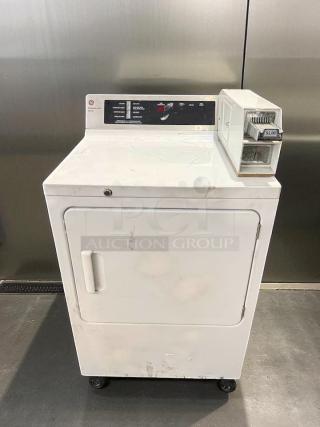 GE DCCD330GD2WC gas coin-operated dryer, excellent condition, tested and working, coin slot marked $1.00, control panel visible.