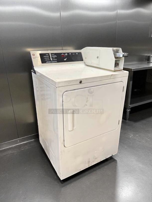 GE DCCD330GD2WC gas coin-operated dryer, excellent condition, tested and working, white, front control panel.