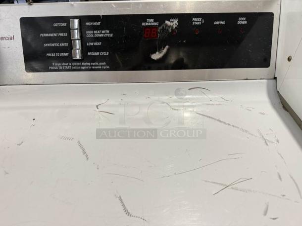 GE gas coin-operated dryer DCCD330GD2WC, excellent condition, working. Control panel shows various settings and LED display.