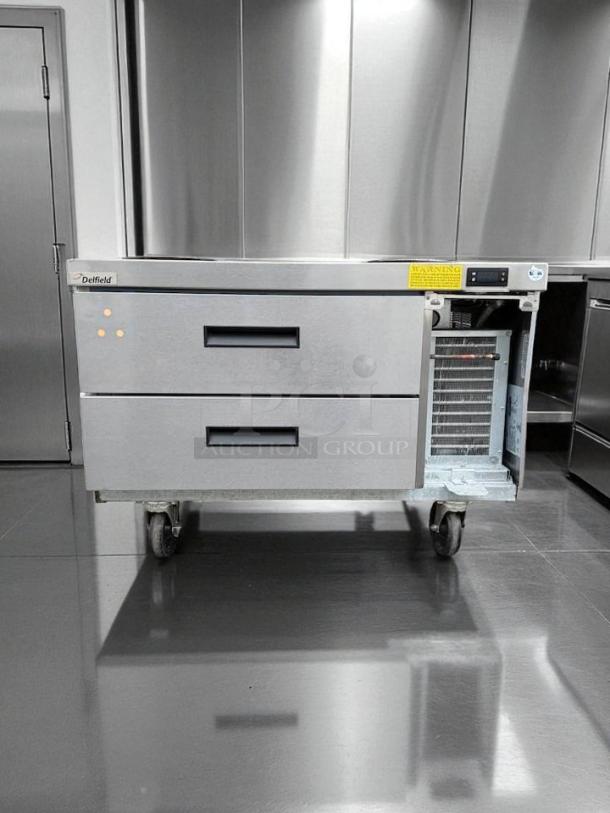Delfield 2 Drawer Refrigerated Chef Base in excellent condition. Tested, working; durable stainless steel, visible branding.