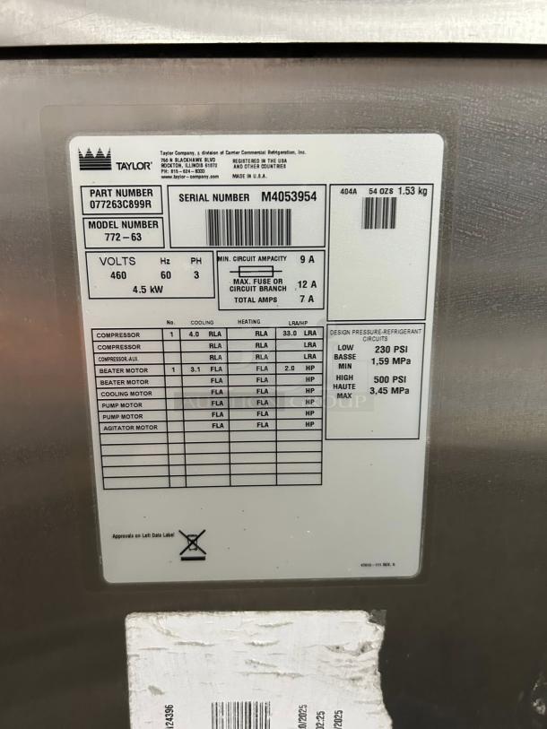 TAYLOR 0772 soft serve freezer with serial M4053954, 220v, 3ph. Tested and working. Detailed electrical specs visible.