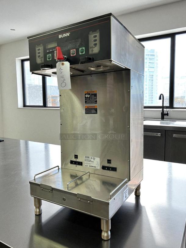 Bunn SH Soft Heat Dual Brewer, stainless steel, 120/208V, tested and working. Features control panel, visible labels, and ID tag.
