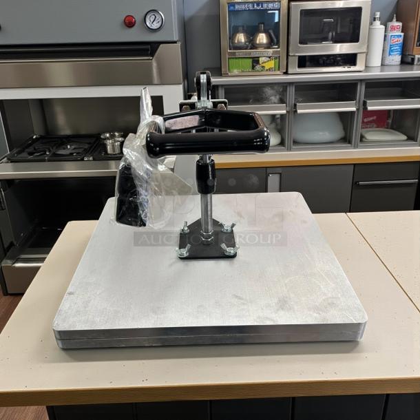 DoughXpress manual pizza dough press in excellent condition, fully tested and working, with sturdy metal construction.
