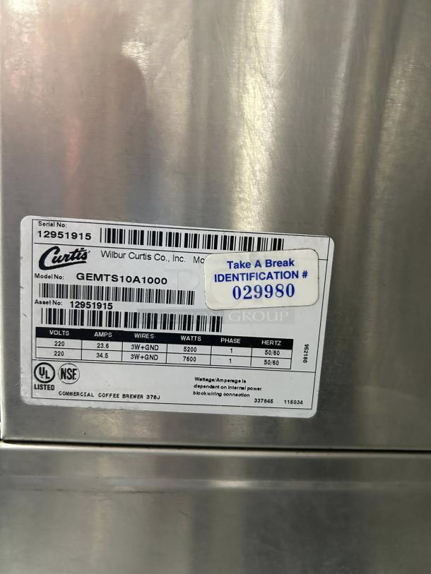Curtis G4GEMT10A1000 Twin Coffee Brewer, dual warmers, 220V, excellent condition, fully tested, identification labels visible.